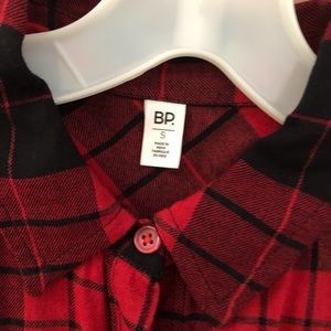 Two plaid flannel shirts